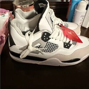 Jordan White and Black Sneakers with Iconic Air Jordan 4 Design